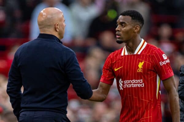 LIVERPOOL, ENGLAND - Sunday, August 25, 2024: Liverpool's Ryan Gravenberch embraces head coach Arne Slot as he is substituted during the FA Premier League match between Liverpool FC and Brentford FC at Anfield. Liverpool won 2-0. (Photo by David Rawcliffe/Propaganda)