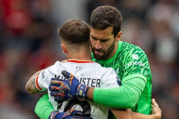 MANCHESTER, ENGLAND - Sunday, September 1, 2024: Liverpool's goalkeeper Alisson Becker (R) embraces Alexis Mac Allister during the FA Premier League match between Manchester United FC and Liverpool FC at Old Trafford. Liverpool won 3-0. (Photo by David Rawcliffe/Propaganda)