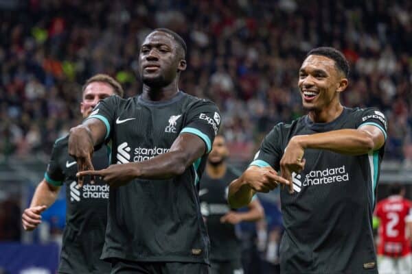 MILAN, ITALY - Tuesday, September 17, 2024: Liverpool's Ibrahima Konaté (L) celebrates with team-mate Trent Alexander-Arnold after scoring his side's first equalising goal with a header during the UEFA Champions League game between AC Milan and Liverpool FC at the Stadio San Siro. Liverpool won 3-1. (Photo by David Rawcliffe/Propaganda)