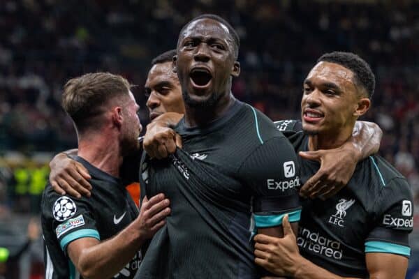 MILAN, ITALY - Tuesday, September 17, 2024: Liverpool's Ibrahima Konaté (C) celebrates with team-mate Trent Alexander-Arnold (R) after scoring his side's first equalising goal with a header during the UEFA Champions League game between AC Milan and Liverpool FC at the Stadio San Siro. Liverpool won 3-1. (Photo by David Rawcliffe/Propaganda)