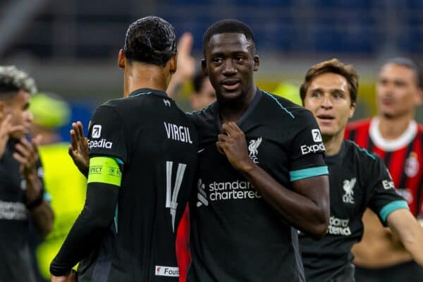 MILAN, ITALY - Tuesday, September 17, 2024: Liverpool's goal-scorers Ibrahima Konaté (R) and captain Virgil van Dijk celebrate after the UEFA Champions League game between AC Milan and Liverpool FC at the Stadio San Siro. Liverpool won 3-1. (Photo by David Rawcliffe/Propaganda)