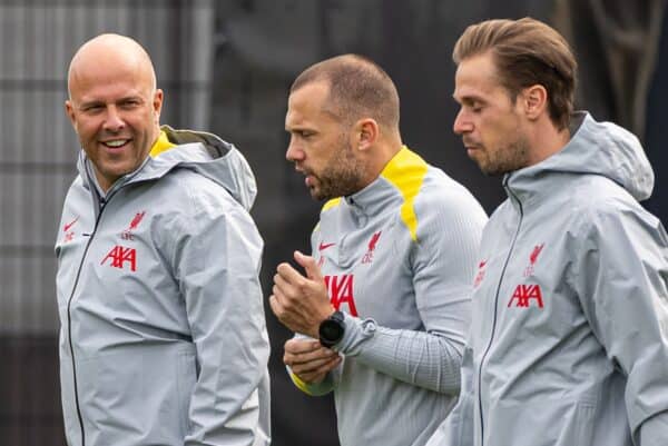 LIVERPOOL, ENGLAND - Tuesday, October 1, 2024: Liverpool's head coach Arne Slot (L) with assistant coach John Heitinga (C) and lead physical performance coach Ruben Peeters (R) during a training session at the AXA Training Centre ahead of the UEFA Champions League match between Liverpool FC and Bologna FC. (Photo by David Rawcliffe/Propaganda)