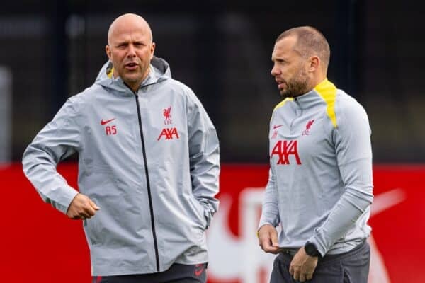 LIVERPOOL, ENGLAND - Tuesday, October 1, 2024: Liverpool's head coach Arne Slot with assistant coach John Heitinga (R) during a training session at the AXA Training Centre ahead of the UEFA Champions League match between Liverpool FC and Bologna FC. (Photo by David Rawcliffe/Propaganda)