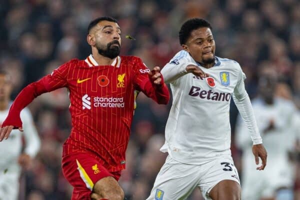 LIVERPOOL, ENGLAND - Saturday, November 9, 2024: Liverpool's Mohamed Salah (L) is challenged by Aston Villa's Leon Bailey as he sets-up the opening goal during the FA Premier League match between Liverpool FC and Aston Villa FC at Anfield. Liverpool won 2-0. (Photo by David Rawcliffe/Propaganda)