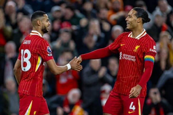 LIVERPOOL, ENGLAND - Sunday, December 1, 2024: Liverpool's Cody Gakpo celebrates with team-mate captain Virgil van Dijk (R) after scoring the opening goal during the FA Premier League match between Liverpool FC and Manchester City FC at Anfield. (Photo by David Rawcliffe/Propaganda)