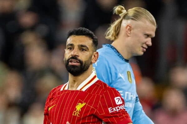 LIVERPOOL, ENGLAND - Sunday, December 1, 2024: Liverpool's Mohamed Salah celebrates after scoring the second goal as Manchester City's Erling Haaland looks dejected during the FA Premier League match between Liverpool FC and Manchester City FC at Anfield. Liverpool won 2-0. (Photo by David Rawcliffe/Propaganda)