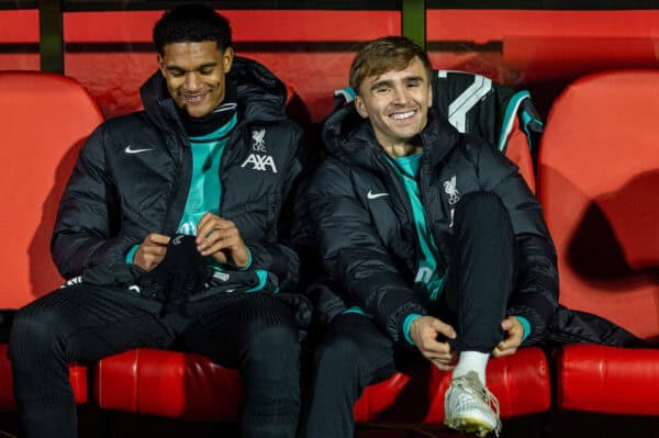 GIRONA, SPAIN - Tuesday, December 10, 2024: Liverpool's Jarell Quansah (L) and James Norris on the bench before the UEFA Champions League game between Girona FC and Liverpool FC at the Estadi Montilivi. Liverpool won 1-0. (Photo by David Rawcliffe/Propaganda)