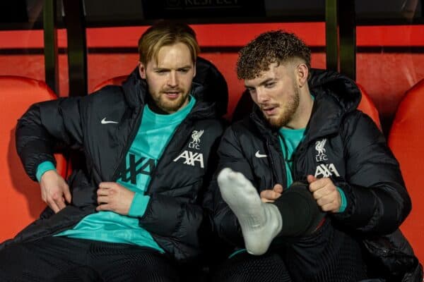 GIRONA, SPAIN - Tuesday, December 10, 2024: Liverpool substitutes goalkeeper Caoimhin Kelleher (L) and Harvey Elliott on the bench before the UEFA Champions League game between Girona FC and Liverpool FC at the Estadi Montilivi. Liverpool won 1-0. (Photo by David Rawcliffe/Propaganda)