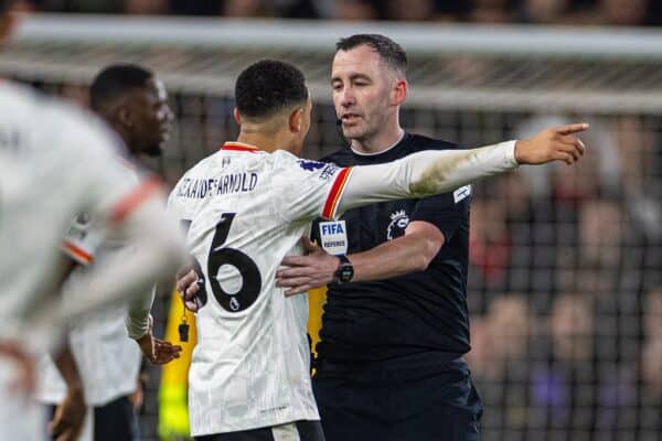 NOTTINGHAM, ENGLAND - Tuesday, January 14, 2025: Liverpool's Trent Alexander-Arnold (L) speaks with referee Chris Kavanagh during the FA Premier League match between Nottingham Forest FC and Liverpool FC at the City Ground. The game ended in a 1-1 draw. (Photo by David Rawcliffe/Propaganda)