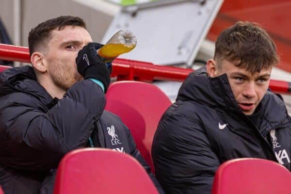 LONDON, ENGLAND - Saturday, January 18, 2025: Liverpool's substitutes Andy Robertson (L) and Conor Bradley on the bench before the FA Premier League match between Brentford FC and Liverpool FC at the Brentford Community Stadium. Liverpool won 2-0. (Photo by David Rawcliffe/Propaganda)