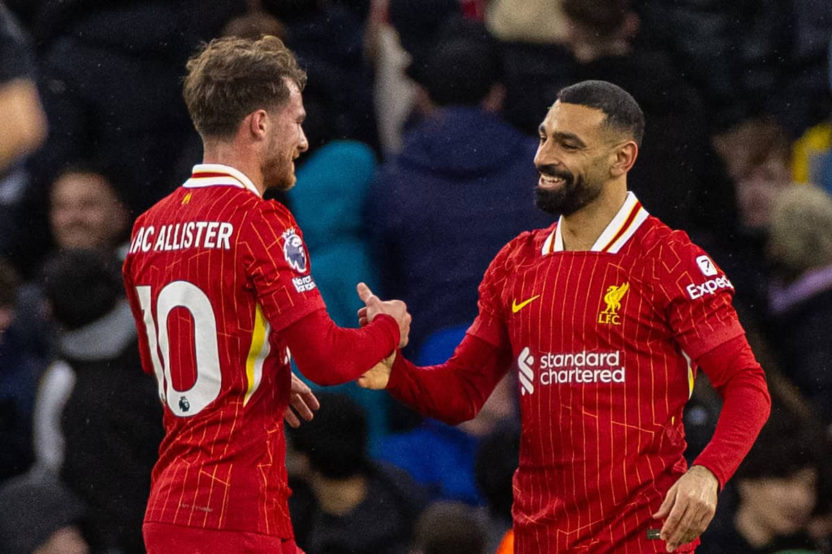 Manchester, England - Sunday, February 23, 2025: Mohamed Salah (R) of Liverpool celebrates with teammate Alexis Mac Allister after scoring the first goal during the PHR Premier League match between Manchester City FC and Liverpool FC in the city of Manchester stadium. Liverpool won 2-0. (Photo by David Rawcliffe/Propaganda)