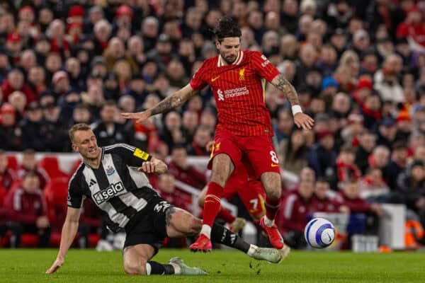 LIVERPOOL, ENGLAND - Wednesday, February 26, 2025: Liverpool's Dominik Szoboszlai (R) is challenged by Newcastle United's Dan Burn during the FA Premier League match between Liverpool FC and Newcastle United FC at Anfield. (Photo by David Rawcliffe/Propaganda)