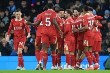 Etihad Stadium, Manchester, UK. 23rd Feb, 2025. Premier League Football, Manchester City versus Liverpool; Dominik Szoboszlai of Liverpool celebrates with his team mates after beating Manchester City goalkeeper Ederson for 0-2 after 37 minutes Credit: Act