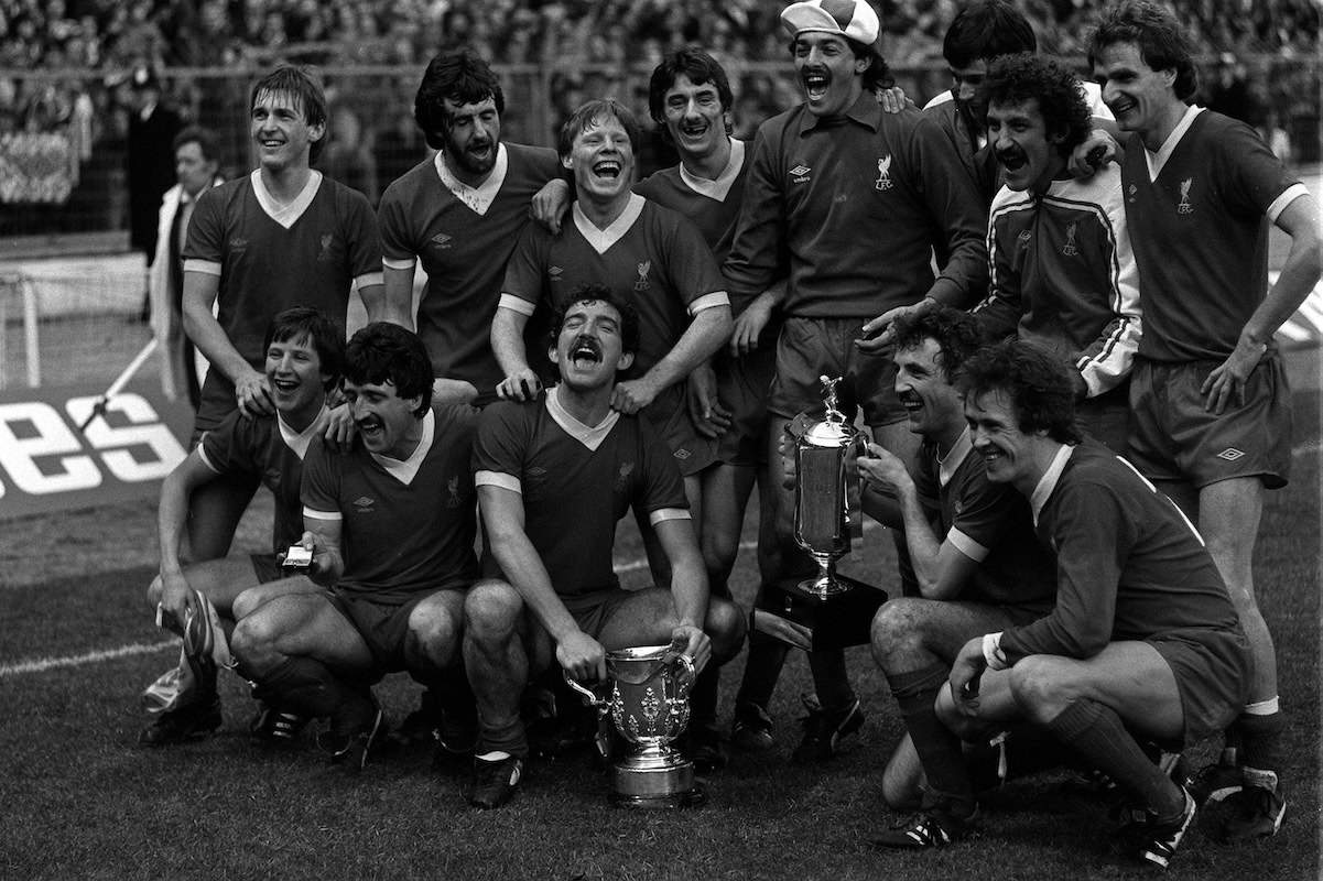 1982 League Cup winners: Liverpool team celebrate their football match League Milk Cup Final win over Tottenham Hotpsur, at Wembley in London. * Pictured holding the old League Cup is Captain Graeme Souness and Alan Kennedy (squatting right) holding the new Milk Cup. Goal scorers are : Ronnie Whelan (far left, squatting) and Ian Rush (fourth left standing)