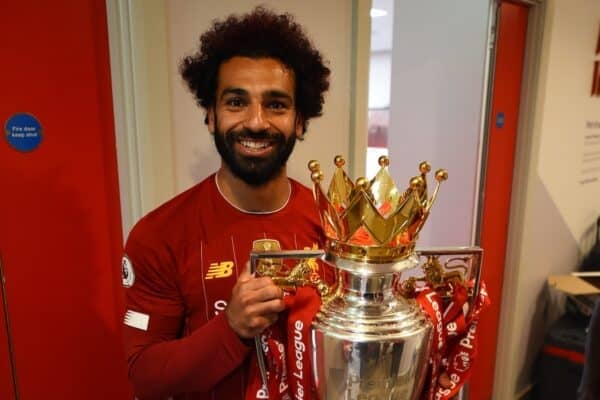 Mohamed Salah with the Premier League trophy, 2020, Anfield. (Photo by Andrew Powell/Liverpool FC via Getty Images)