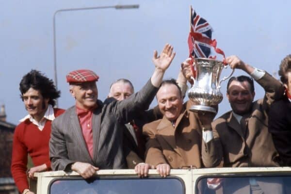 LIVERPOOL. UK. Open top bus parade with the 1974 F A Cup. Left to right: Kevin Keegan, LFC striker, Bill Shankly in tartan cap, LFC Manager, unidentified, Sir John Smith, LFC Chairman, Bob Paisley, LFC Assistant manager. (Getty Images)