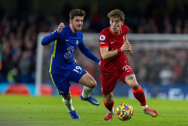 LONDON, ENGLAND - Sunday, January 2, 2022: Liverpool's Kostas Tsimikas (R) Chelsea's Mason Mount during the FA Premier League match between Chelsea FC and Liverpool FC at Stamford Bridge. (Pic by David Rawcliffe/Propaganda)