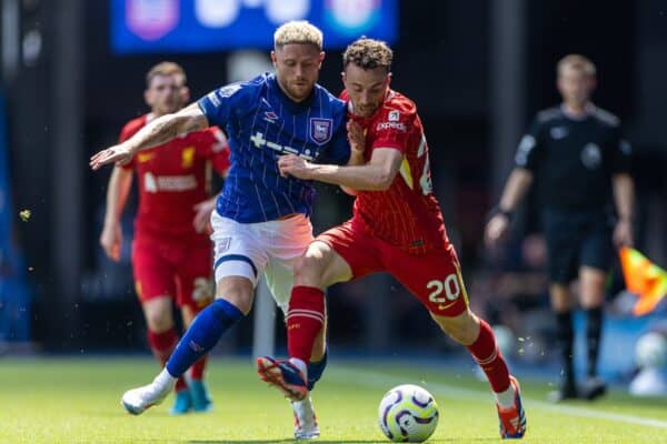 IPSWICH, ENGLAND - Saturday, August 17, 2024: Liverpool's Diogo Jota (R) is challenged by Ipswich Town's Wes Burns during the FA Premier League match between Ipswich Town FC and Liverpool FC at Portman Road. (Photo by David Rawcliffe/Propaganda)