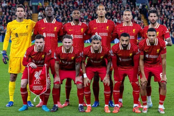 LIVERPOOL, ENGLAND - Wednesday, October 2, 2024: Liverpool players line-up for a team group photograph before the UEFA Champions League game between Liverpool FC and Bologna FC 1909 at Anfield. Back row L-R: goalkeeper Alisson Becker, Ibrahima Konaté, Ryan Gravenberch, captain Virgil van Dijk, Darwin Núñez, Dominik Szoboszlai. Front row L-R: Bologna’s Charalampos Lykogiannis, Alexis Mac Allister, Luis Díaz, Mohamed Salah, Trent Alexander-Arnold. (Photo by David Rawcliffe/Propaganda)