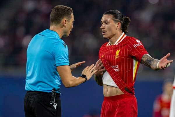 LEIPZIG, GERMANY - Wednesday, October 23, 2024: Liverpool's Darwin Núñez (R) speaks with referee Sandro Schärer during the UEFA Champions League Match Day 3 game between RB Leipzig and Liverpool FC at the Red Bull Arena. (Photo by David Rawcliffe/Propaganda)