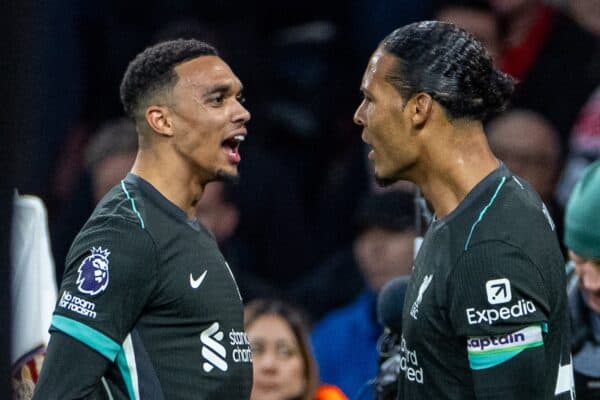  Liverpool's captain Virgil van Dijk (R) celebrates with team-mate Trent Alexander-Arnold after scoring the first equalising goal during the FA Premier League match between Arsenal FC and Liverpool FC at the Emirates Stadium. (Photo by David Rawcliffe/Propaganda)