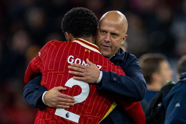 LIVERPOOL, ENGLAND - Saturday, November 2, 2024: Liverpool's Joe Gomez (L) embraces head coach Arne Slot after the FA Premier League match between Liverpool FC and Brighton & Hove Albion FC at Anfield. (Photo by David Rawcliffe/Propaganda)