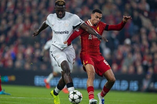 LIVERPOOL, ENGLAND - Wednesday, October 2, 2024: Bayer Leverkusen's Victor Boniface (L) is challenged by Liverpool's Trent Alexander-Arnold during the UEFA Champions League game between Liverpool FC and Bologna FC 1909 at Anfield. (Photo by David Rawcliffe/Propaganda)