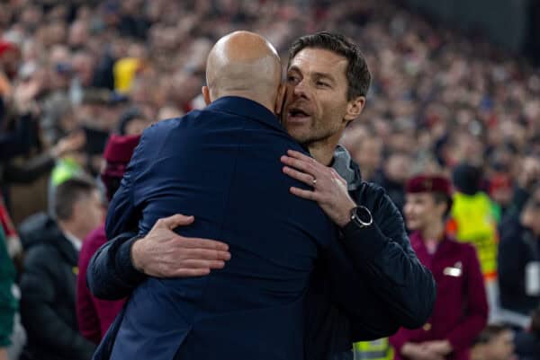 LIVERPOOL, ENGLAND - Wednesday, October 2, 2024: Liverpool's head coach Arne Slot (L) embraces Bayer Leverkusen's head coach Xabi Alonso before the UEFA Champions League game between Liverpool FC and Bologna FC 1909 at Anfield. (Photo by David Rawcliffe/Propaganda)