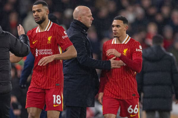 LIVERPOOL, ENGLAND - Sunday, January 5, 2025: Liverpool's Trent Alexander-Arnold walks off past head coach Arne Slot as he is substituted during the FA Premier League match between Liverpool FC and Manchester United FC at Anfield. (Photo by David Rawcliffe/Propaganda)