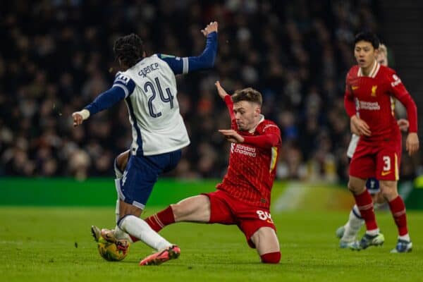 LONDON, ENGLAND - Wednesday, January 8, 2025: Liverpool's Conor Bradley (R) challenges Djed Spence of Tottenham Hotspur during the Football League Cup semi-final match between Tottenham Hotspur FC and Liverpool FC at Tottenham Hotspur Stadium. (Photo by David Rawcliffe/Propaganda)