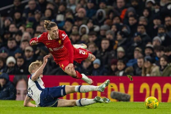 LONDON, ENGLAND - Wednesday, January 8, 2025: Liverpool's Kostas Tsimikas is challenged by Tottenham Hotspur's Lucas Bergvall during the Football League Cup Semi-Final 1st Leg match between Tottenham Hotspur FC and Liverpool FC at the Tottenham Hotspur Stadium. (Photo by David Rawcliffe/Propaganda)