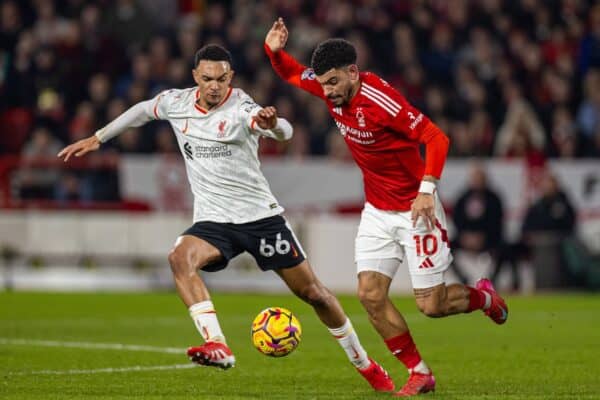 NOTTINGHAM, ENGLAND - Tuesday, January 14, 2025: Liverpool's Trent Alexander-Arnold (L) and Nottingham Forest's Morgan Gibbs-White during the FA Premier League match between Nottingham Forest FC and Liverpool FC at the City Ground. (Photo by David Rawcliffe/Propaganda)