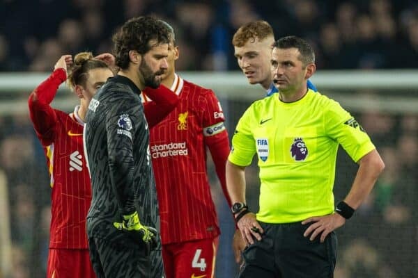 LIVERPOOL, ENGLAND - Wednesday, February 12, 2025: Referee Michael Oliver with Liverpool's goalkeeper Alisson Becker during the FA Premier League match between Everton FC and Liverpool FC, the 245th Merseyside Derby and the last one at Goodison Park. The game ended in a 2-2 draw. (Photo by David Rawcliffe/Propaganda)