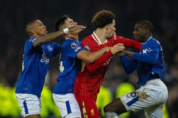 LIVERPOOL, ENGLAND - Wednesday, February 12, 2025: Liverpool's Curtis Jones`and Everton's Abdoulaye Doucouré clash afrter the FA Premier League match between Everton FC and Liverpool FC, the 245th Merseyside Derby and the last one at Goodison Park. (Photo by David Rawcliffe/Propaganda)