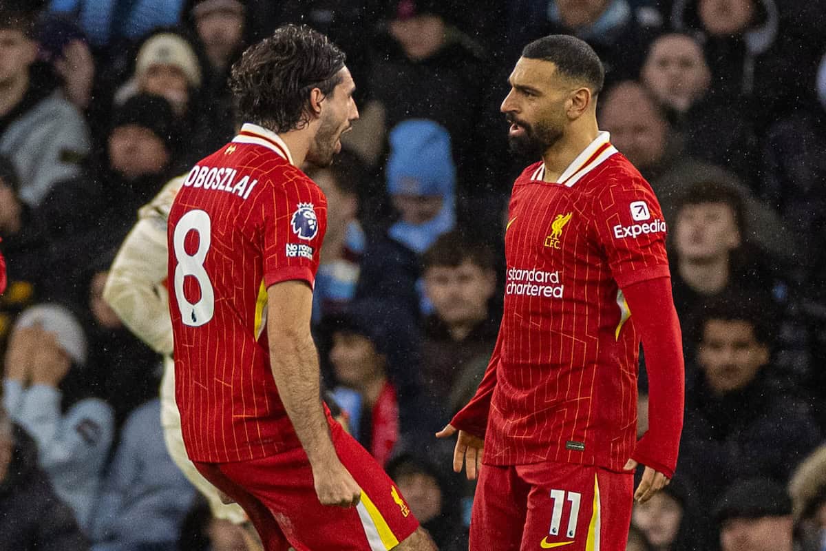 MANCHESTER, ENGLAND - Sunday, February 23, 2025: Liverpool's Dominik Szoboszlai (L) celebrates with team-mate Mohamed Salah after scoring the second goal during the FA Premier League match between Manchester City FC and Liverpool FC at the City of Manchester Stadium. (Photo by David Rawcliffe/Propaganda)