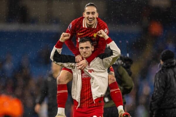 MANCHESTER, ENGLAND - Sunday, February 23, 2025: Liverpool's Kostas Tsimikas (top) and Andy Robertson celebrate after the FA Premier League match between Manchester City FC and Liverpool FC at the City of Manchester Stadium. Liverpool won 2-0. (Photo by David Rawcliffe/Propaganda)