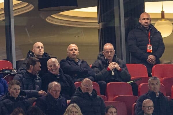 LIVERPOOL, ENGLAND - Wednesday, February 26, 2025: Liverpool's head coach Arne Slot (C) and first assistant coach Sipke Hulshoff (R) watch from the stands as they serve the first of a two match suspension during the FA Premier League match between Liverpool FC and Newcastle United FC at Anfield. (Photo by David Rawcliffe/Propaganda)