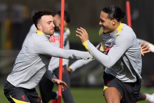  Liverpool's Diogo Jota (L) and captain Virgil van Dijk during a training session at the AXA Training Centre ahead of the UEFA Champions League match between Paris Saint-Germain and Liverpool FC. (Photo by Jessica Hornby/Propaganda)