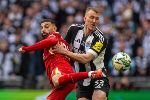 LONDON, ENGLAND - Sunday, March 16, 2025: Liverpool's Mohamed Salah (L) is challenged by Newcastle United's Dan Burn during the Football League Cup Final match between Liverpool FC and Newcastle United FC at Wembley Stadium. (Photo by David Rawcliffe/Propaganda)