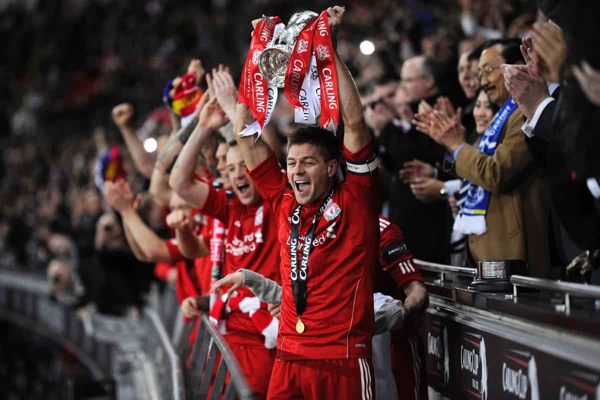 Liverpool's Steven Gerrard celebrates with the Carling Cup Trophy