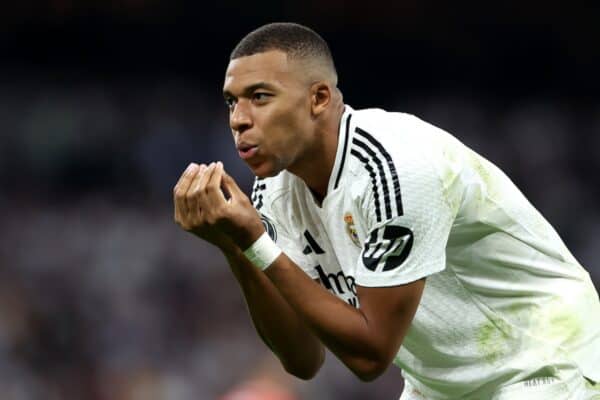 MADRID, SPAIN - SEPTEMBER 17: Kylian Mbappe of Real Madrid celebrates scoring his team's first goal during the UEFA Champions League 2024/25 League Phase MD1 match between Real Madrid CF and VfB Stuttgart at Estadio Santiago Bernabeu on September 17, 2024 in Madrid, Spain. (Photo by Gonzalo Arroyo - UEFA/UEFA via Getty Images)