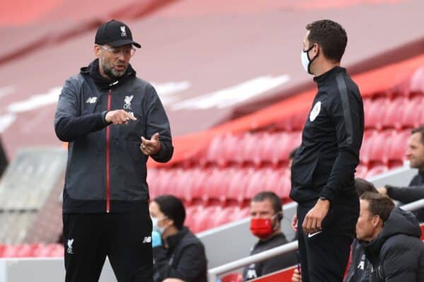 Klopp (left) gestures towards fourth official Coote during a Premier League match at Anfield (Carl Recine/NMC Pool/PA)